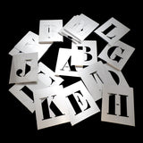 Vintage metalen letters-stencils
